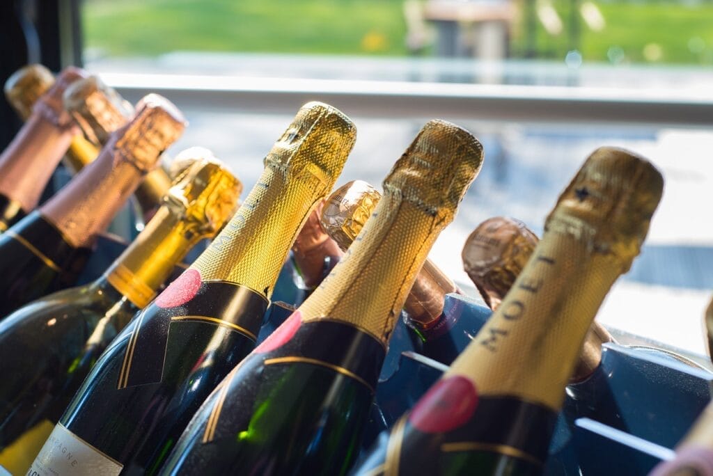 Bottles of Moet and Chandon, one of the champagne houses you can visit on a day trip from Paris to the Champagne region.