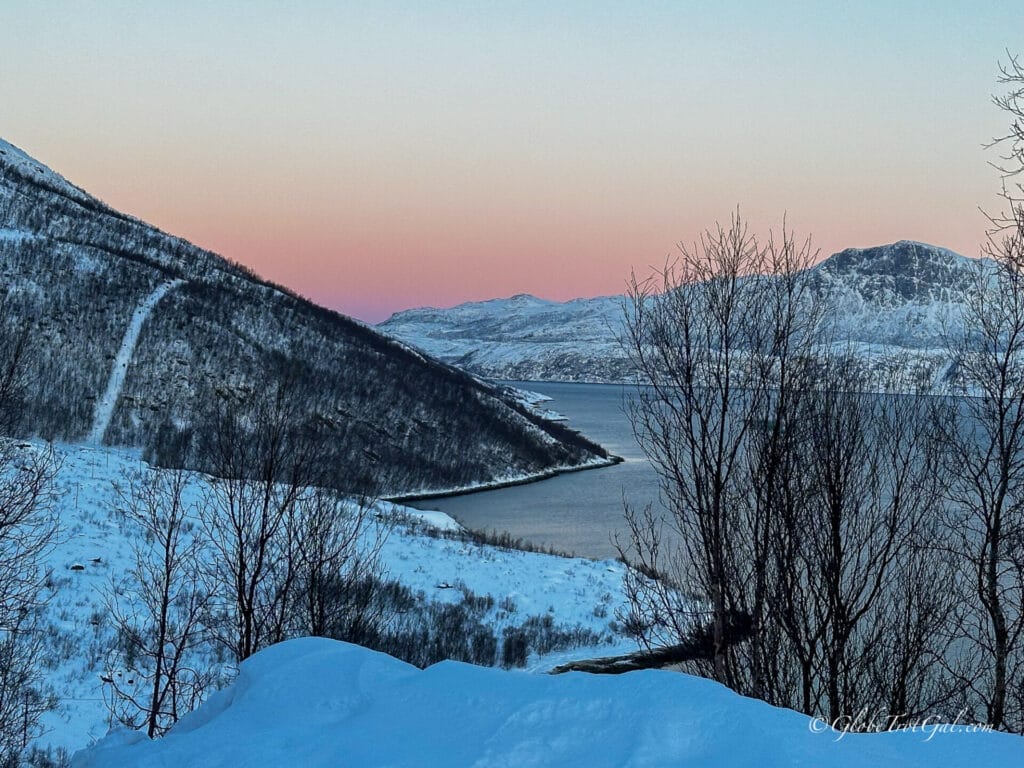 Sunset over a fjord just outside of Tromsø, Norway.