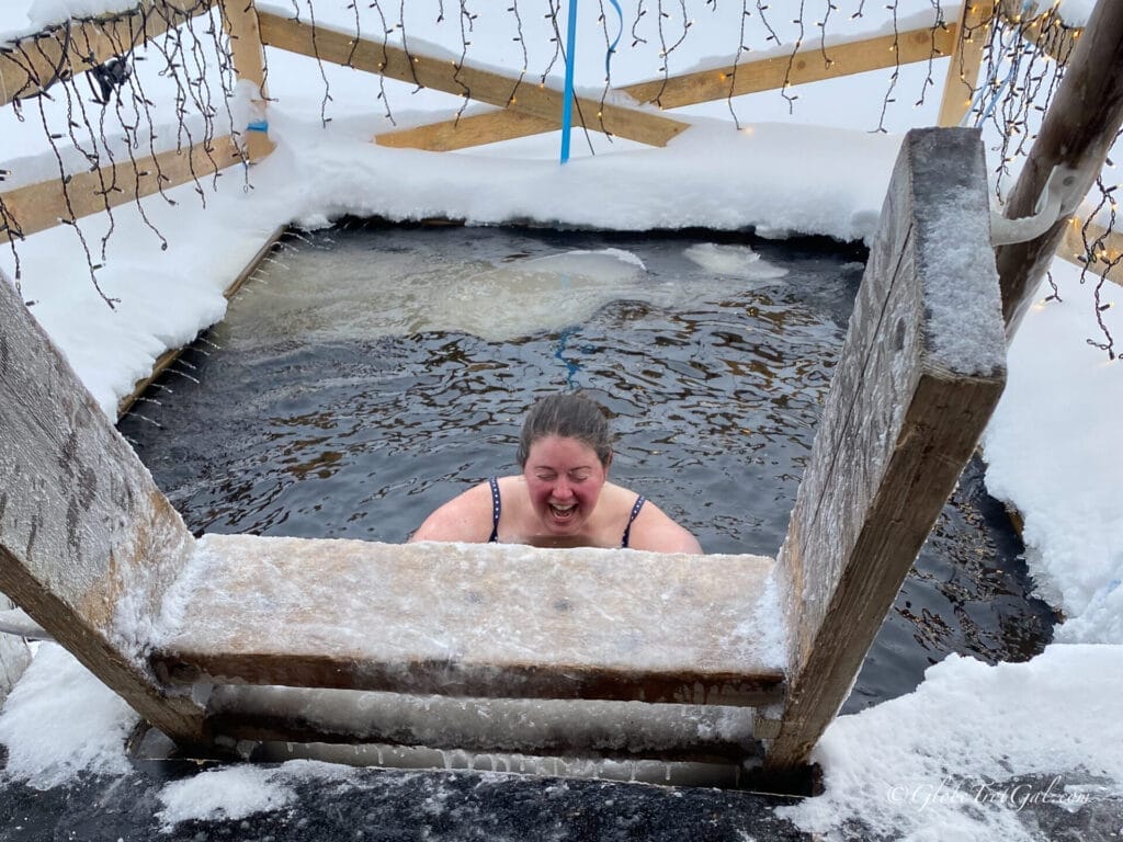 Me taking a dip in ice water after the sauna.